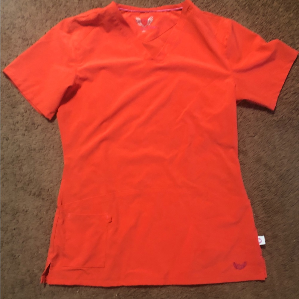 I no longer need this beautiful small neon orange scrub Top